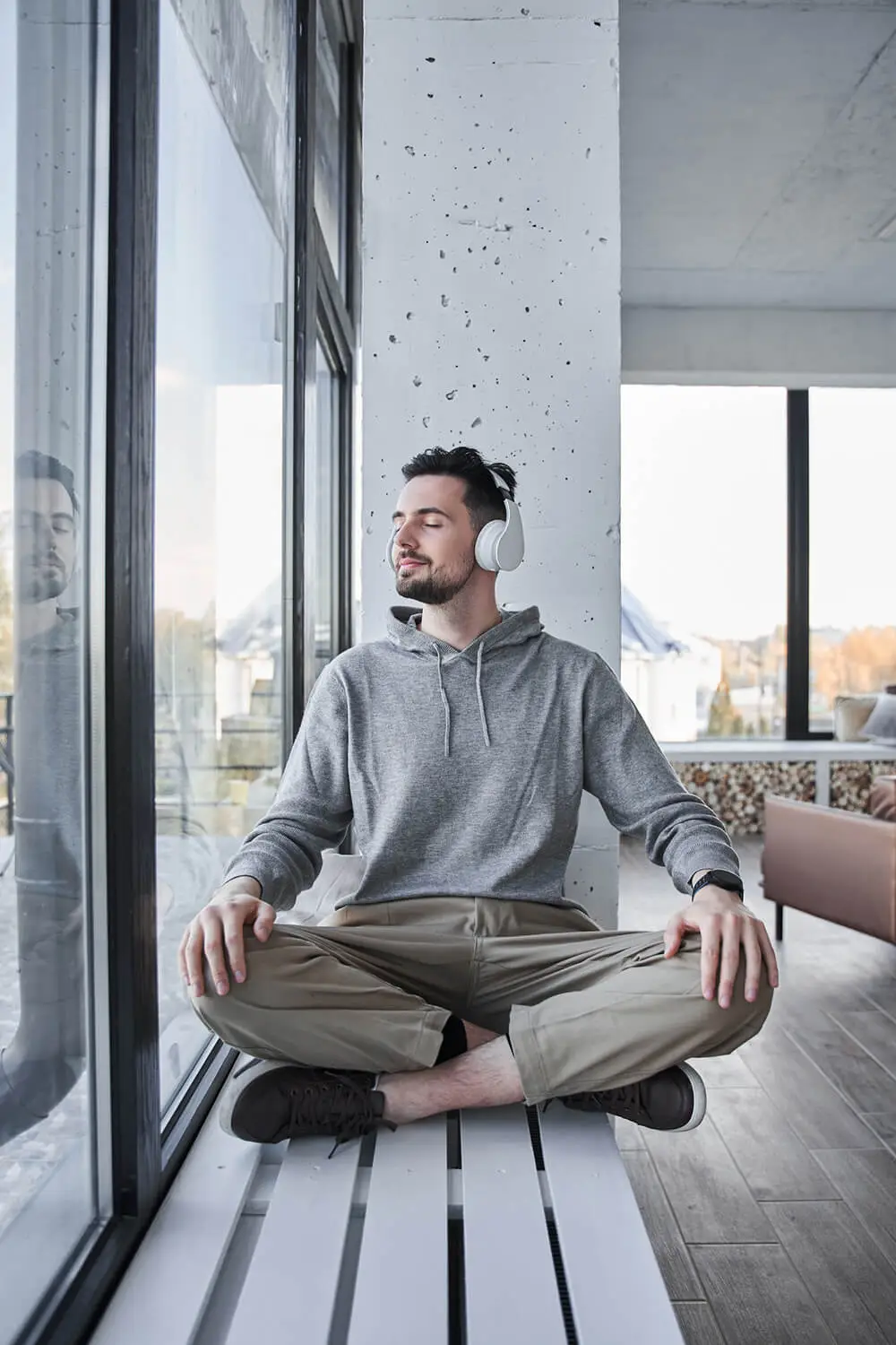 Man listening to headphones mindfulness calm