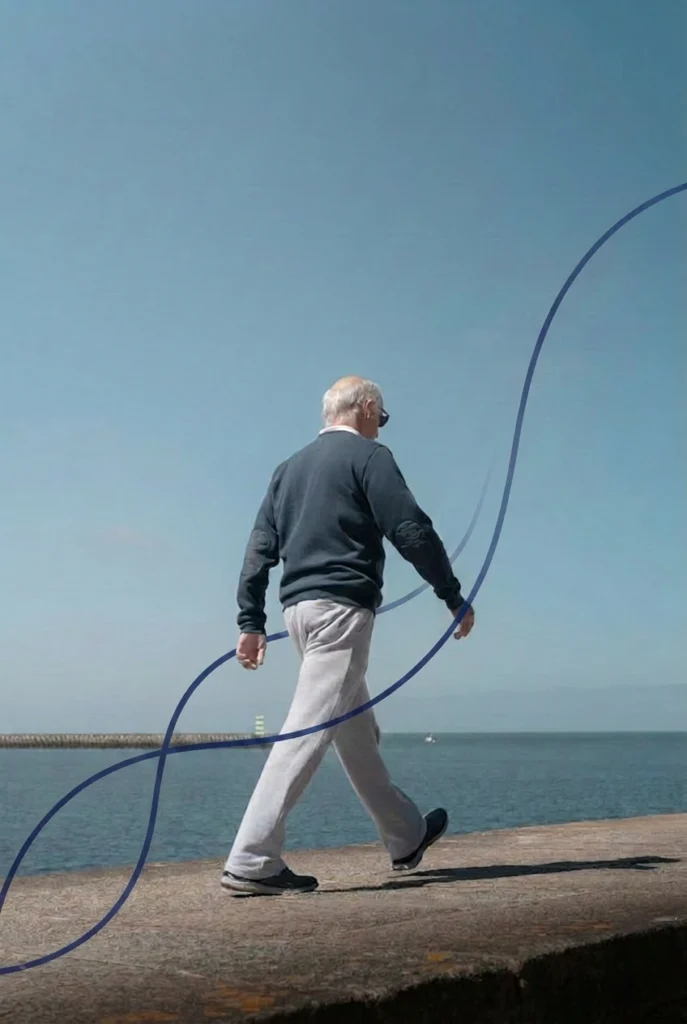 Older man walking outdoors